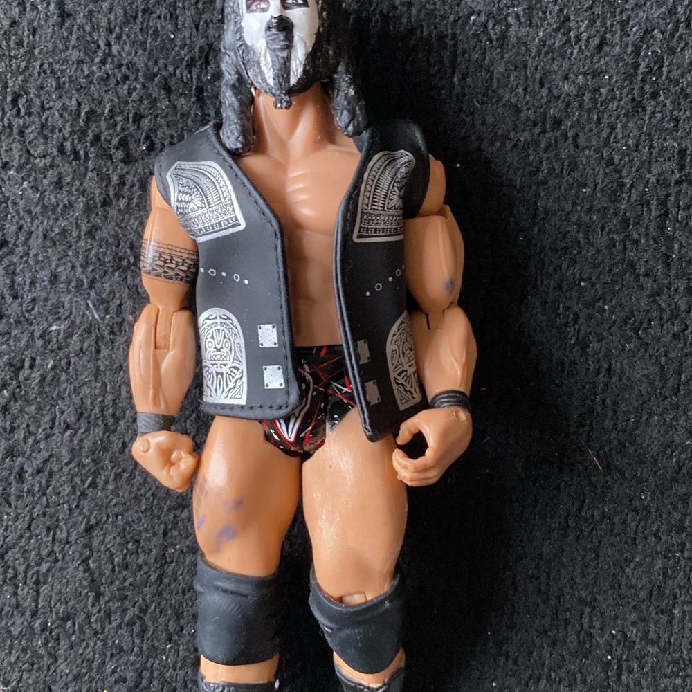 Action Figure with Black Vest and Mask